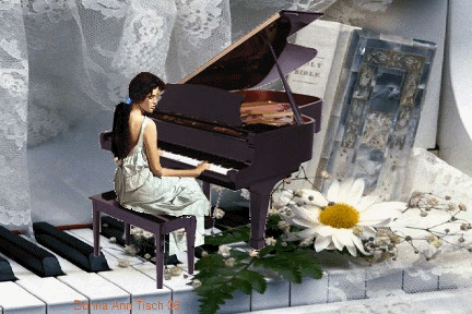 Gify-muzyczne - muzyczne fortepian kobieta gra na fortepianie1.gif